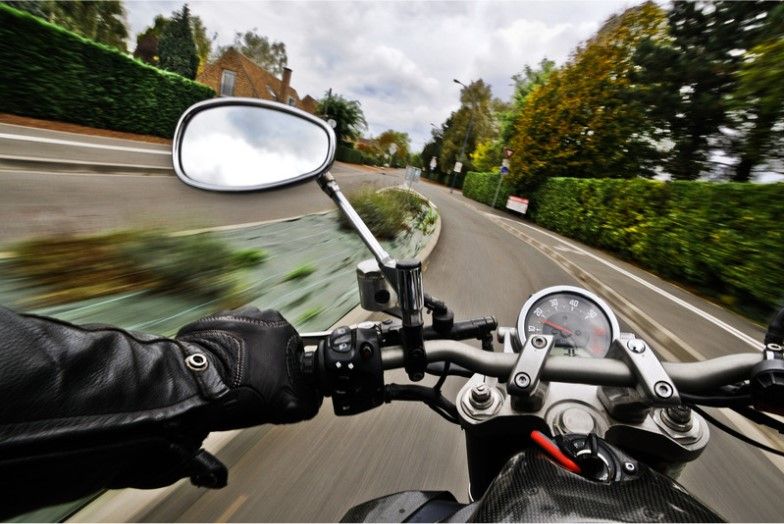 motorcyclist driving around a corner